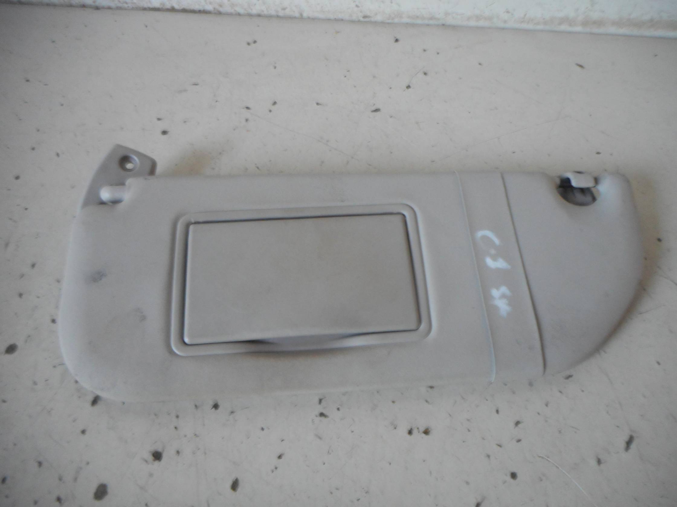 Aletta parasole parabrezza sx.